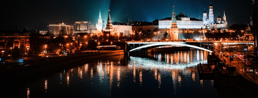Russian - Moscow bridge with lighted buildings in the background